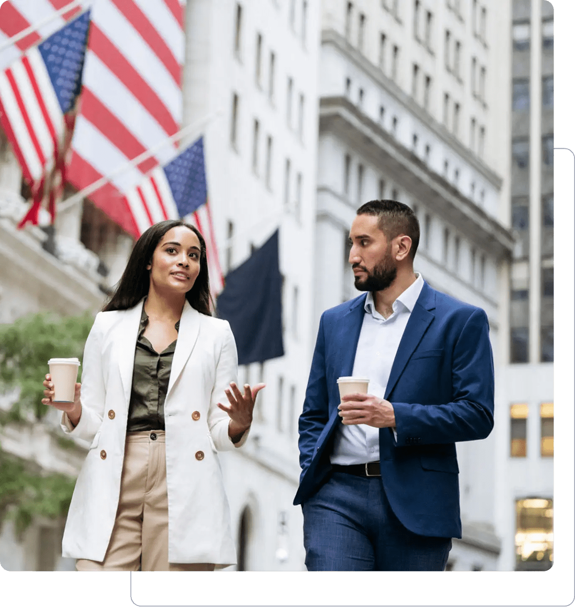 People walking and talking with coffee cups.